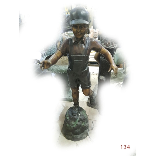 134 - A bronze figure of a Boy on a rock.

Height: 139cm