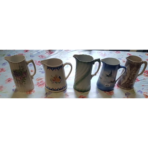 403 - A good quantity of Vintage Jugs.