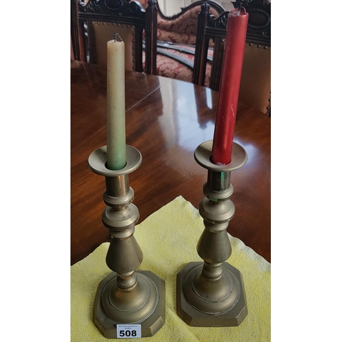 508 - A good pair of 19th Century Brass Candlesticks.