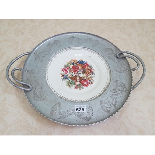 529 - An unusual hand painted Plate in a tin mount.