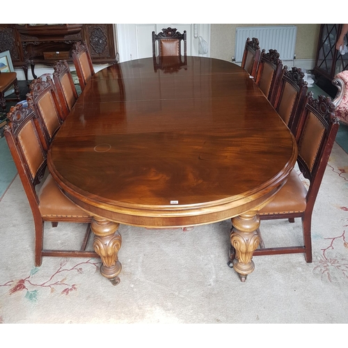 560 - A magnificent Victorian Mahogany D end Dining Table with highly carved supports and brass castors wi... 