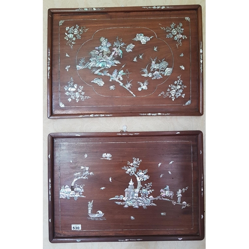 530 - A good pair of Oriental Timber Wall Plaques.