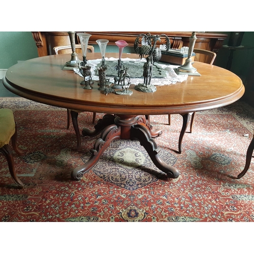 619 - An oval Victorian Mahogany Breakfast Table with scissor pod. H 76 x L 156 x W 124cm.