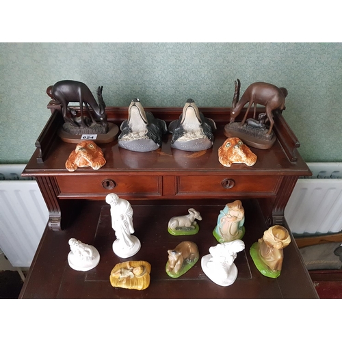 624 - A quantity of Figures of Dogs and Hardwood Figures.