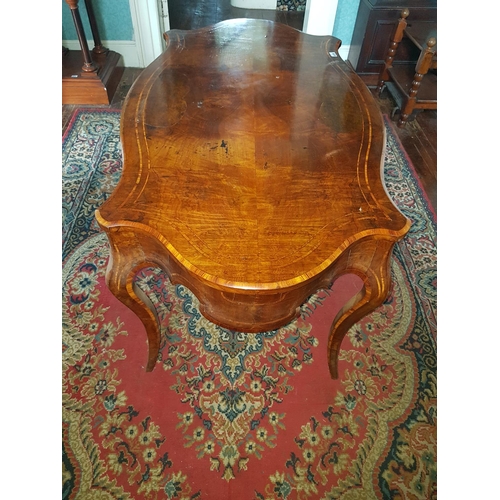 635 - A really fine mid 19th Century Walnut and Burr Walnut Inlaid Centre Table with a serpentine outline ... 