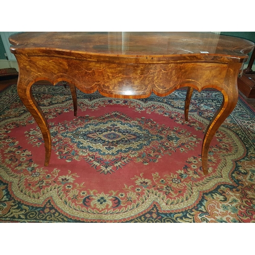 635 - A really fine mid 19th Century Walnut and Burr Walnut Inlaid Centre Table with a serpentine outline ... 