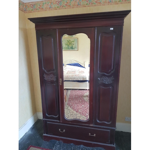 658 - An Edwardian Mahogany single door Wardrobe with mirrored door. H 209 x W 136cm.