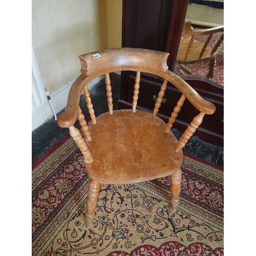 660 - A 19th Century Elm Smokers Chair.