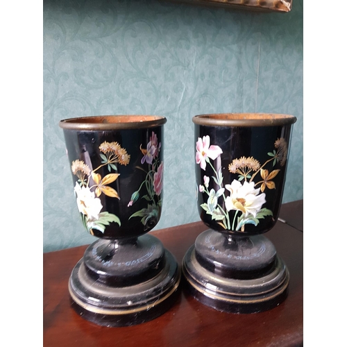 666 - A pair of early 20th Century Oriental Metal Cloisonne style Urns with raised hand painted decoration... 