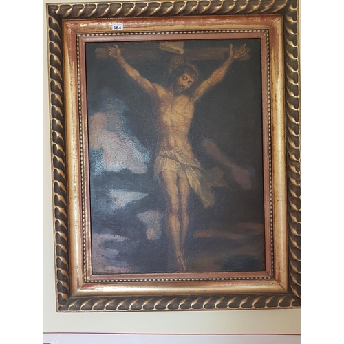 684 - A 20th possibly 19th Century Oil on Board of Christ on the Cross.