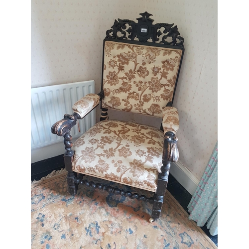 696 - A late 19th Century Oak Bishop's Chair with plaque to the back.