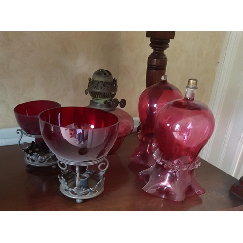 558f - A quantity of Cranberry Glass.