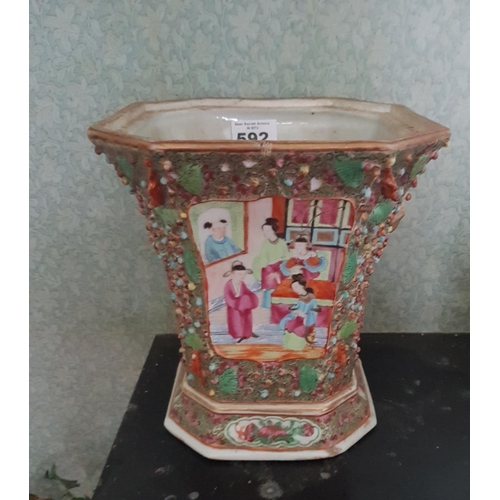 592 - An Oriental Planter. 21cm High x 19cms square.