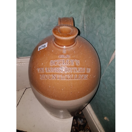 670 - A good Stoneware Flagon. Skullys. The largest Bottlers in Mountmellick.