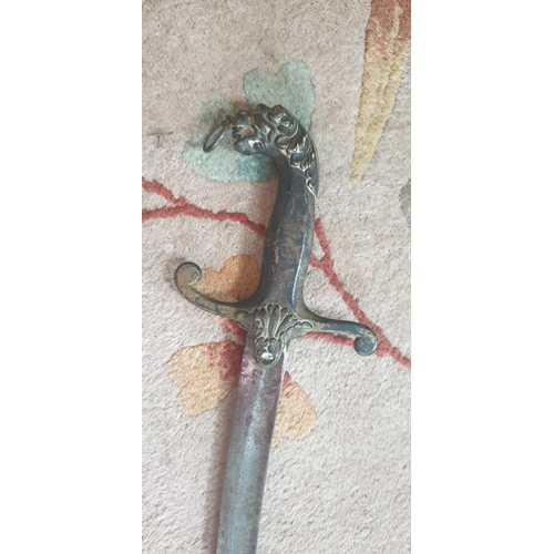 545 - A 19th Century Arabic Sword and Scabbard.