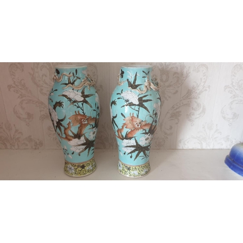 710 - Two pairs of vases along with a pottery shoe. Blue vases 23cms high