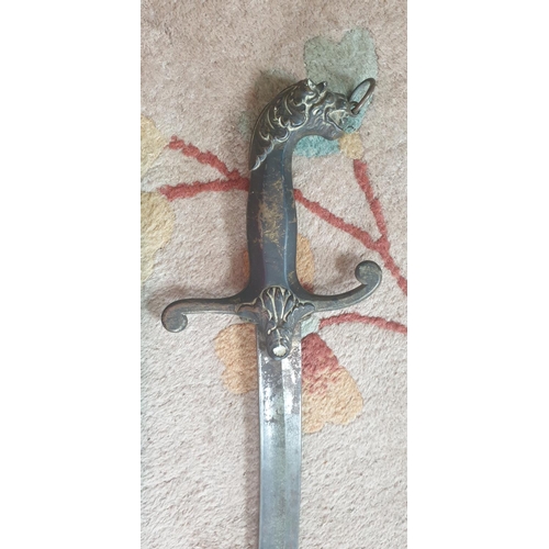 545 - A 19th Century Arabic Sword and Scabbard.