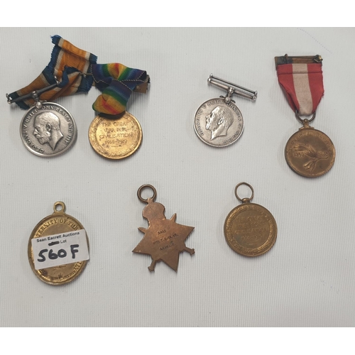 560f - A group of World War 1 and other Medals presented to Private T Doolan and Private  J West, along wit... 