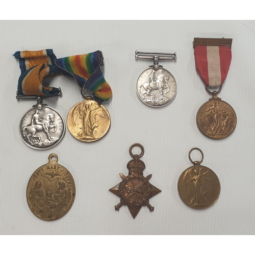 560f - A group of World War 1 and other Medals presented to Private T Doolan and Private  J West, along wit... 