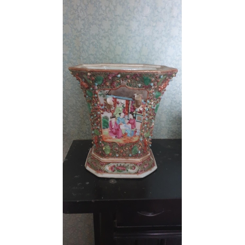 592 - An Oriental Planter. 21cm High x 19cms square.