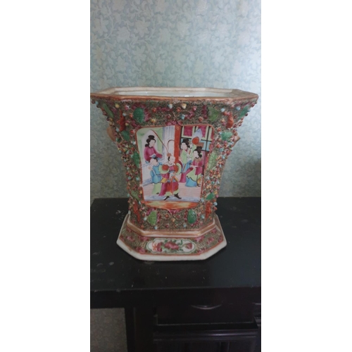 592 - An Oriental Planter. 21cm High x 19cms square.