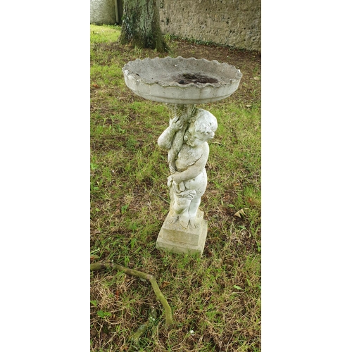 769b - A plaster Bird Bath depicting a Cherub.