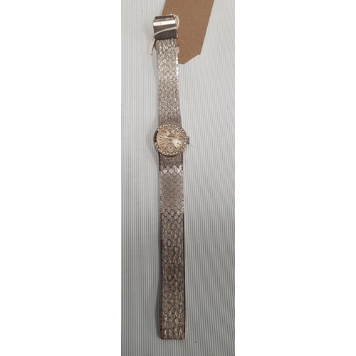 153 - A Ladies Wristwatch stamped Omega 18ct Gold antimagnetic, Swiss made, with strap.