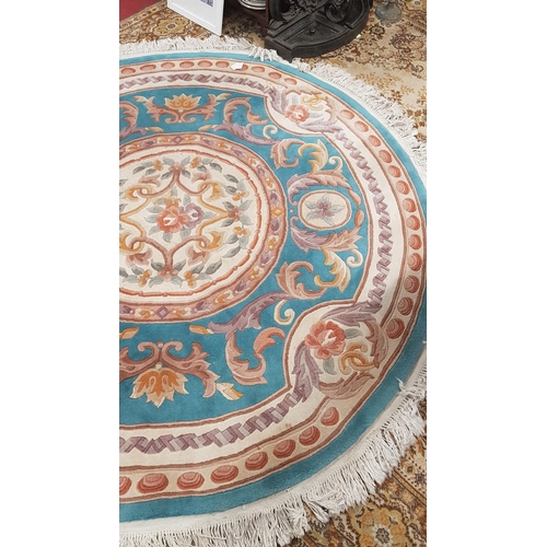 507 - A large circular Oriental deep pile Rug with blue ground. Diameter 210cms.