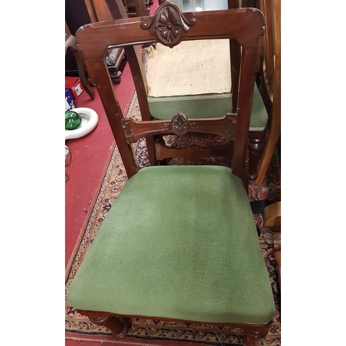 720 - A good set of eight 19th Century Mahogany Dining Chairs with carved backs.