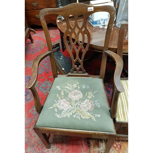 879 - A late 19th Century Carver along with a single chair.