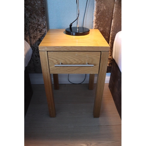 108 - An oak bedside Table with drawer. 400w x 400d x 600h.