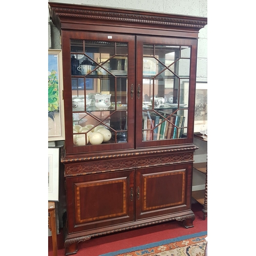 151 - A large two door glazed Display Cabinet with a roped edge.H 212 W 134 D 44.