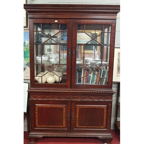 151 - A large two door glazed Display Cabinet with a roped edge.H 212 W 134 D 44.