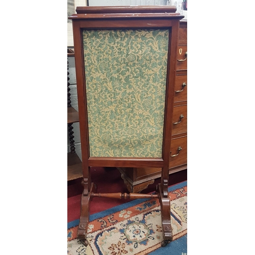 162 - A 19th Century Mahogany Fire Screen with a fabric panel centre.