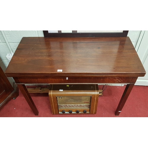 208 - A Regency Mahogany Foldover Tea Table.