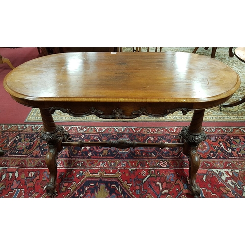 23 - A really good Victorian Walnut Centre Table with turned and carved end supports and legs.