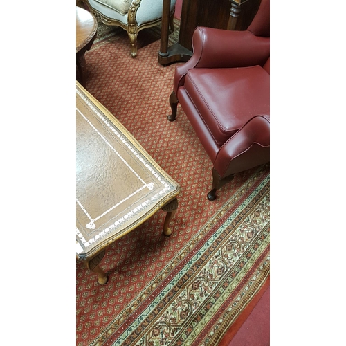 257 - A large Rust Ground Carpet with multi borders and repeating pattern centre.350 x 250 cms.