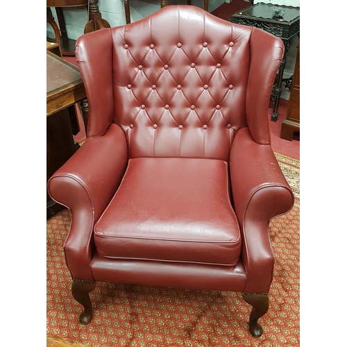 266 - A lovely pair of Oxblood deep buttoned Wingback Chairs.