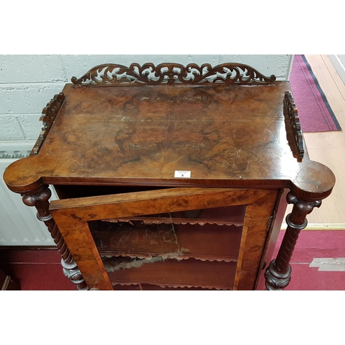 3 - A 19th Century Walnut Side Cabinet with turned columned supports and glazed single door. Circa 1850-... 