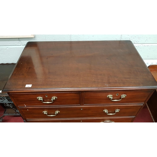 77 - A Georgian Mahogany Chest of Drawers with original swan neck handles. 95 (W) x 57 (D) x 97 (H).