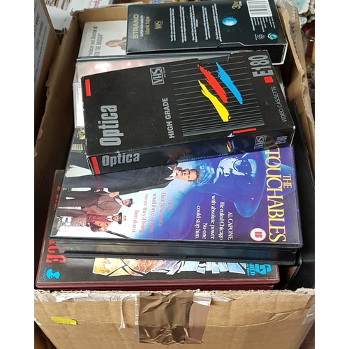 47 - A large quantity of D.V.D.s along with V.H.S tapes and players and other items in one box.