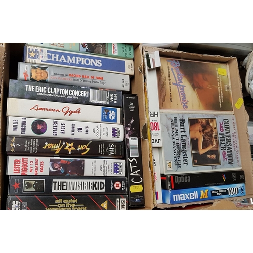 47 - A large quantity of D.V.D.s along with V.H.S tapes and players and other items in one box.