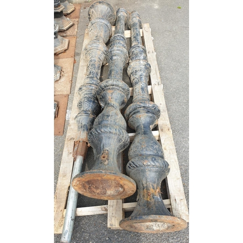 220 - A very large Cast Iron Lamp Post with lion head feature. Approx. 387cm.