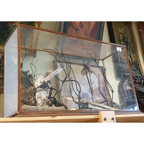 4 - A cased Taxidermy style prop of a Tarantula, Scorpion, Dragonflies etc.  W 72 x D 24 x H 44cm approx... 