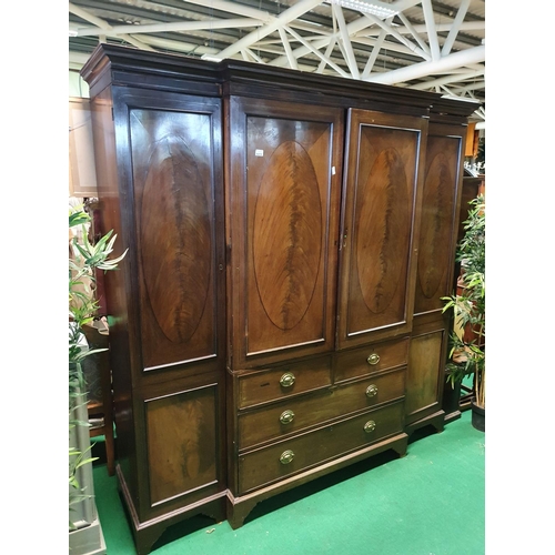 6415 - A fabulous early 19th Century four door breakfront Wardrobe with centre chest. C1820. Approximately ... 