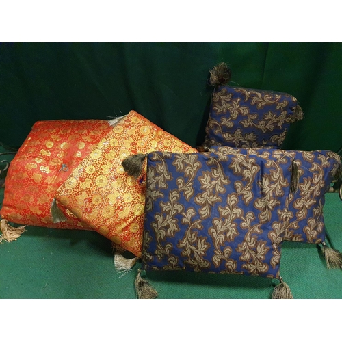 352 - BADLANDS SERIES 3: A pair of orange and gold Japanese Cushions along with three blue and gold Japane... 