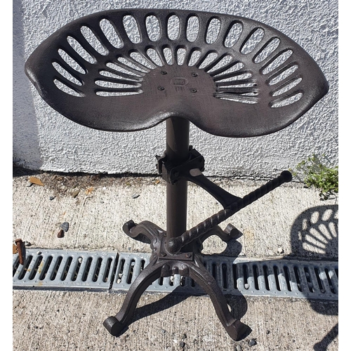 263 - A cast Iron Tractor seat Stool.