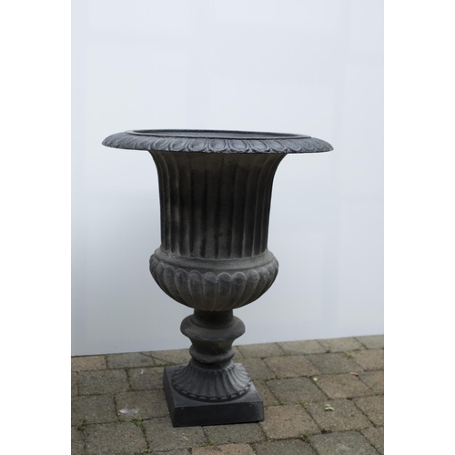 246 - A pair of Cast Iron Urns with reeded and fluted outline. H 68 x Diam 54.