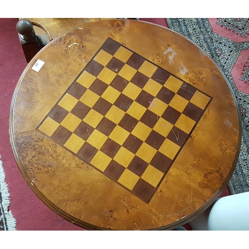 373 - A modern Table with Chess Board Top. 60 cms diam.