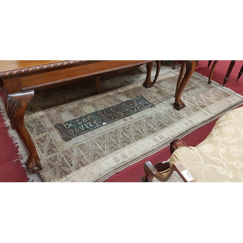 470A - A Cream Ground Carpet. 250 x 155 cms.